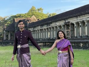 Indian Visitors Wearing Traditional Khmer Attire at Angkor Wat