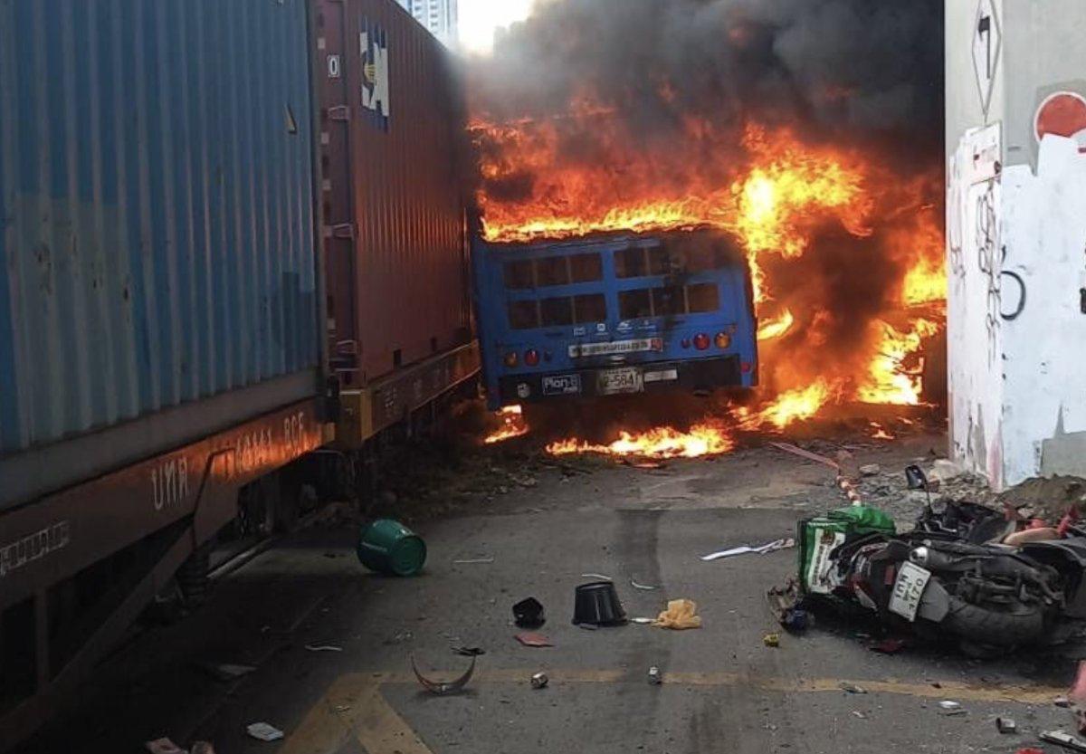 BREAKING: Bus Erupts in Flames After Train Collision in Bangkok